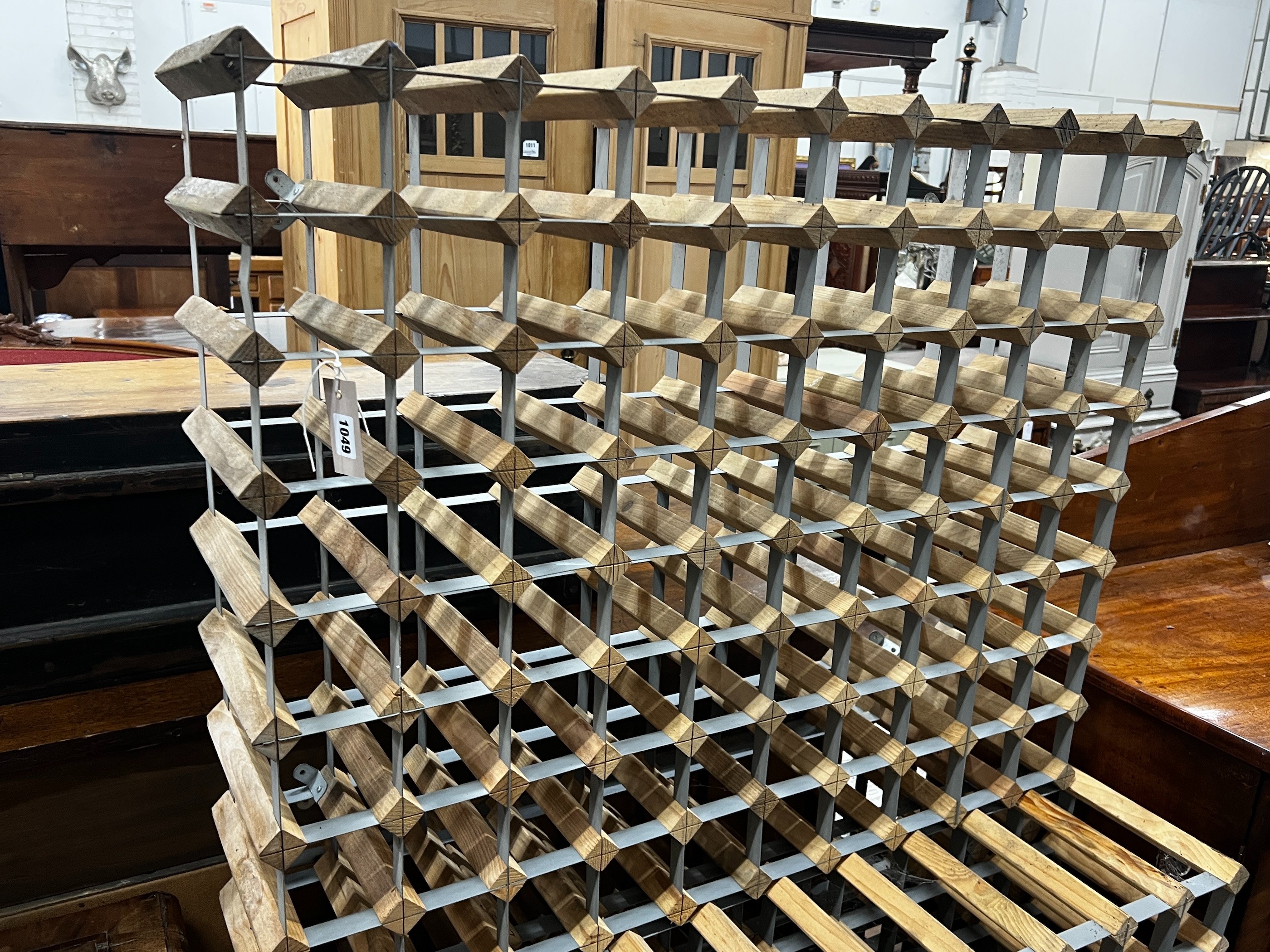 Three modern wine racks, total capacity 240 bottles, each width 99cm, height 80cm